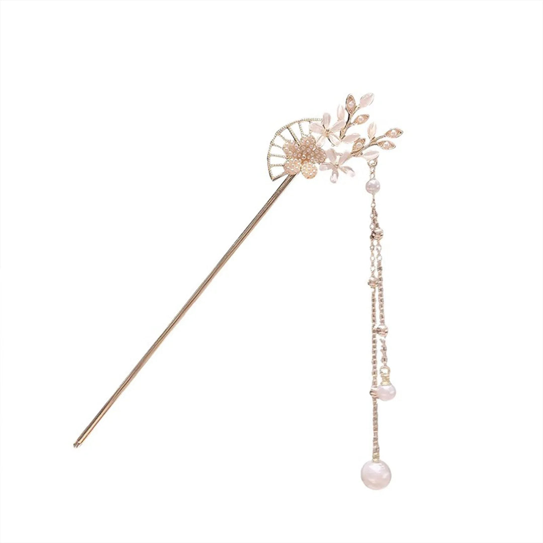 Baguette à cheveux fleur de pêche plaquées or