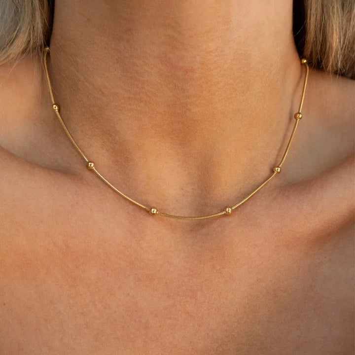Collier fleur en acier japonais