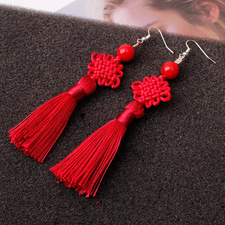 Boucle d'oreille japonaise nœud en soie tressée raffinée