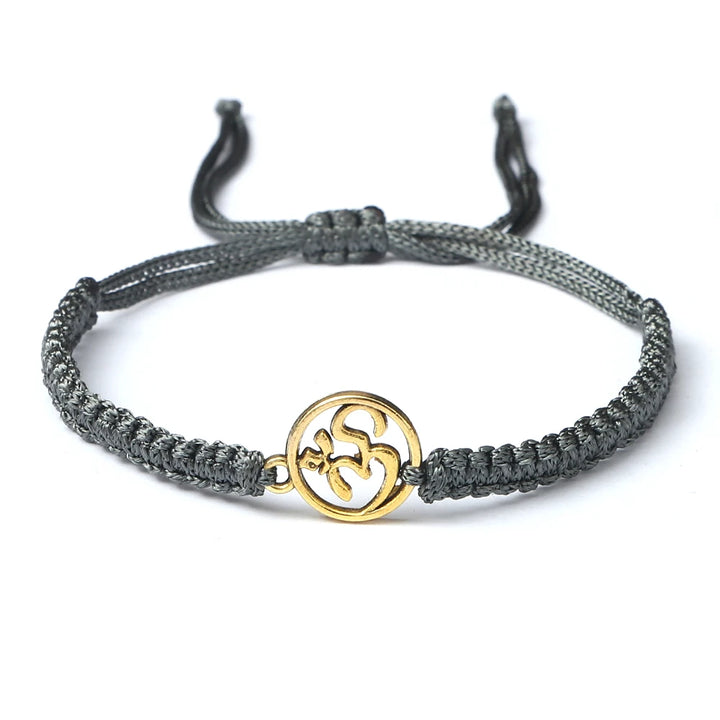 Bracelet porte-bonheur japonais en corde tressée gris