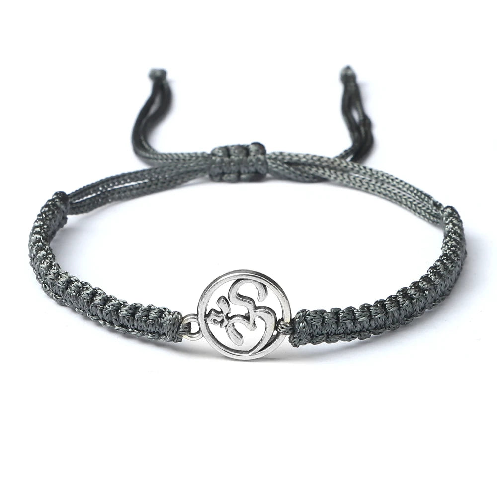 Bracelet porte-bonheur japonais en corde tressée gris argent