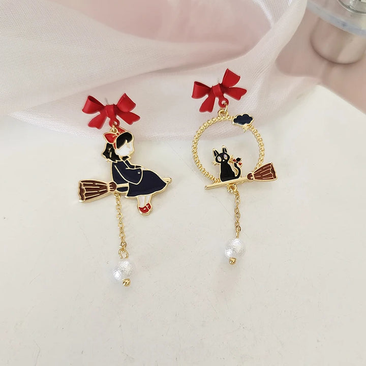 Boucle d'oreille japonaise émail chat balai